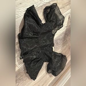Black going out top with puffy sleeves